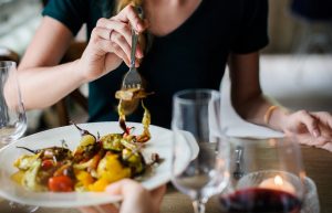 Image of a woman enjoying dinner