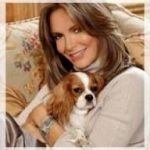 Jaclyn Smith with a Blenheim Cavalier King Charles Spaniel